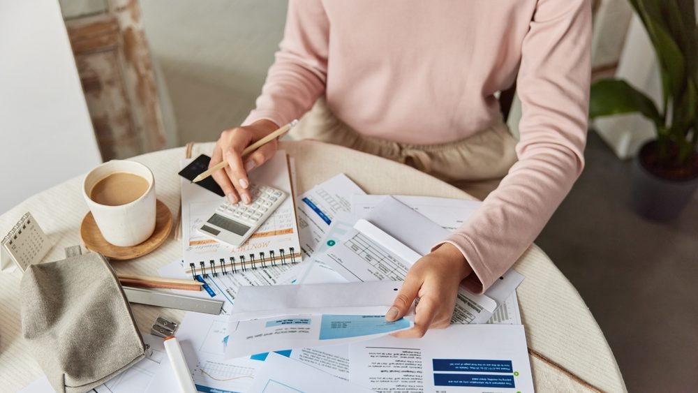 Person looking at bills