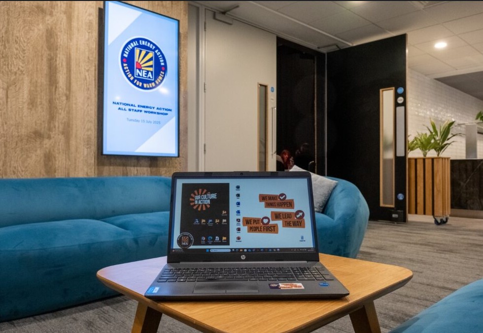 Laptop showing National Energy Action's values.