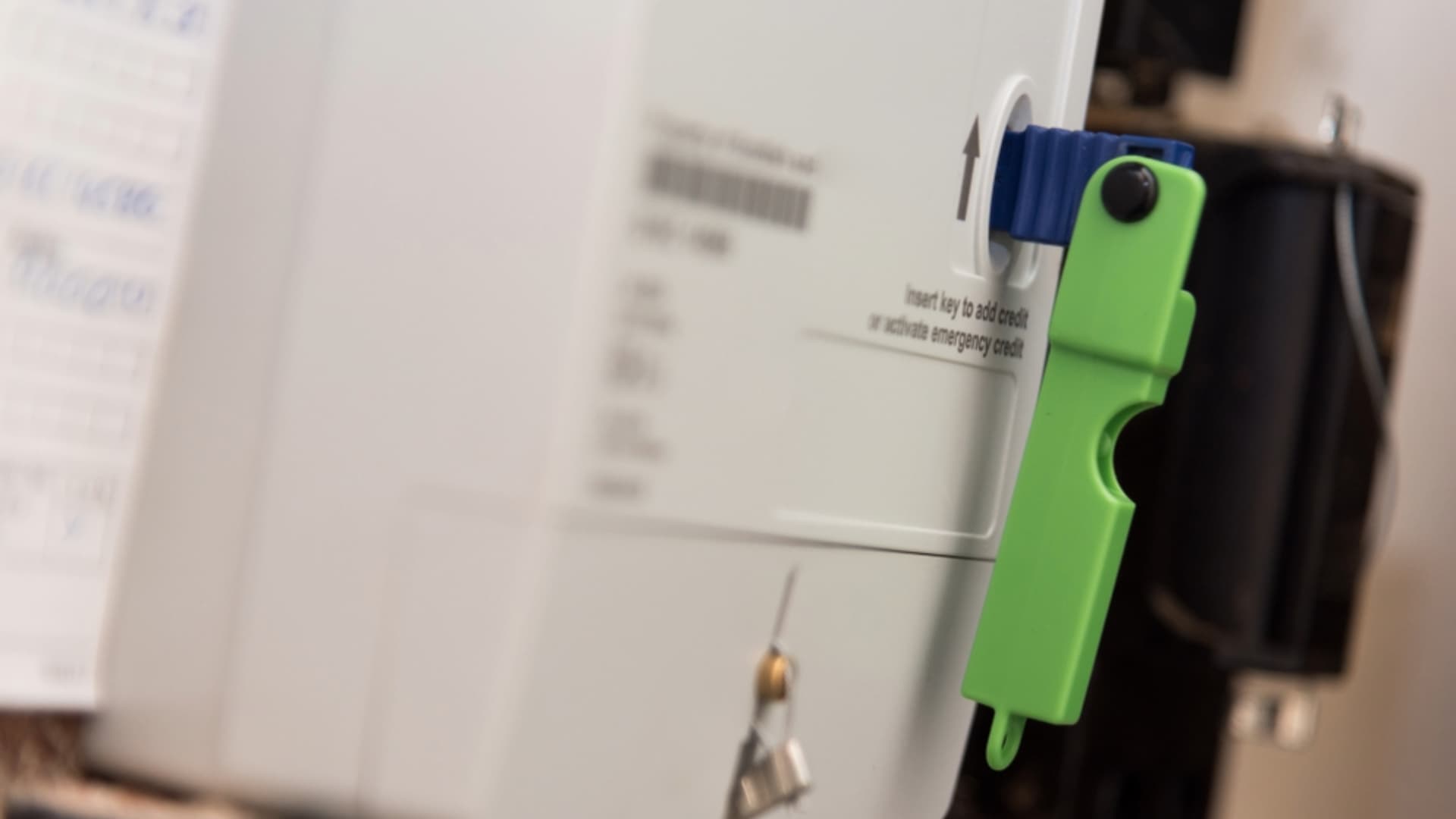 A prepayment meter key inside a meter.