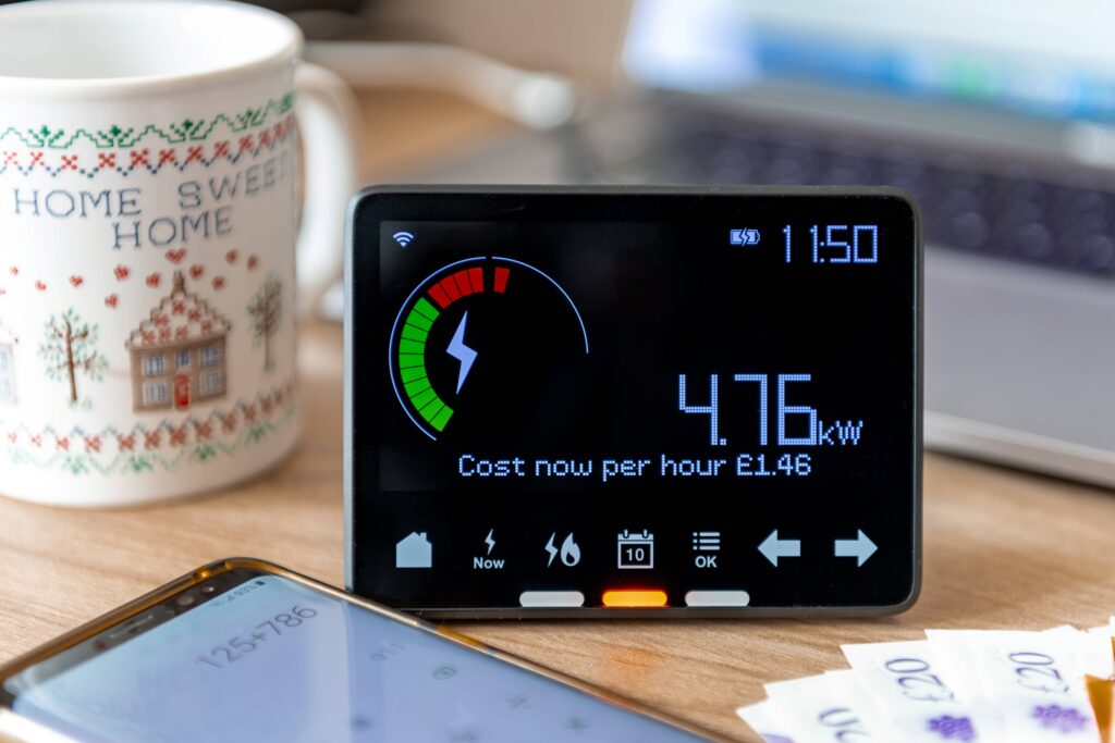 A photo of an in home display connected to a smart meter.