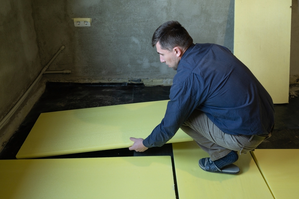 Floor insulation being installed.